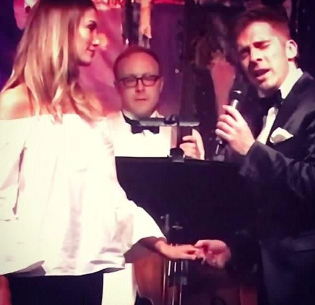 Delta and Hugh looked loved up during the performance. Source: Instagram