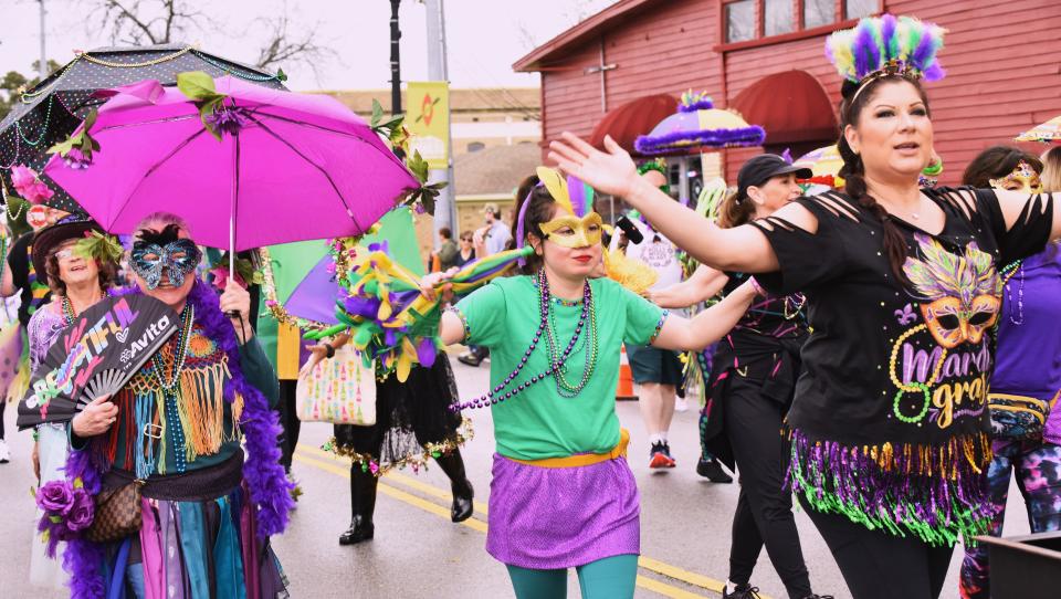 The parade at the inaugural Bastrop Mardi Gras celebration Saturday drew an assortment of colorful costumes. The three-day event, including a Mardi Gras Ball, a sizzling gumbo cook-Off and an infusion of authentic Cajun and Zydeco music.