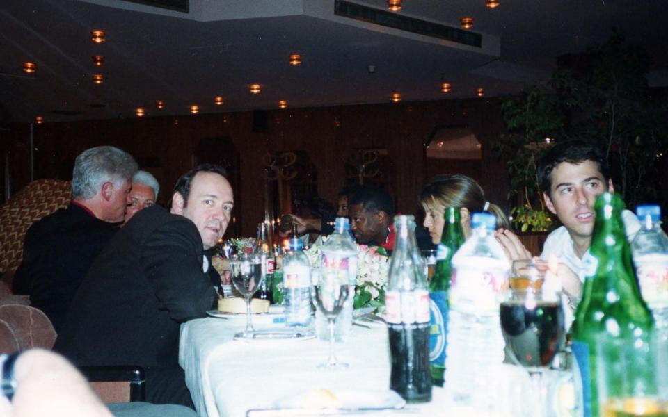 Kevin Spacey with Bill Clinton at a dinner during their trip - CDWES/The Mega Agency