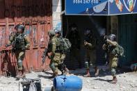 Clashes occur during the funeral of 12-year-old Palestinian boy Mohammad Al Alami in West Bank