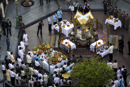 Thai government officials attend a religious ceremony at the Erawan shrine, the site of Monday's deadly blast, in central Bangkok, Thailand, August 21, 2015. REUTERS/Athit Perawongmetha