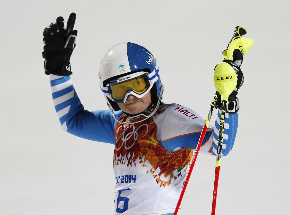 Finland's Tanja Poutiainen gestures after finishing the second run of the women's slalom at the Sochi 2014 Winter Olympics, Friday, Feb. 21, 2014, in Krasnaya Polyana, Russia. (AP Photo/Christophe Ena)