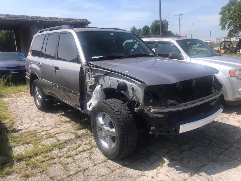 Linda Head's Land Cruiser sits in the parking lot of the former Queen City Rod & Custom shop on West Bypass. Head brought her Land Cruiser to her then-neighbor Reed Arnold in June to fix body damage from hitting a deer. She got it back without the promised work, but has yet to receive a promised refund.