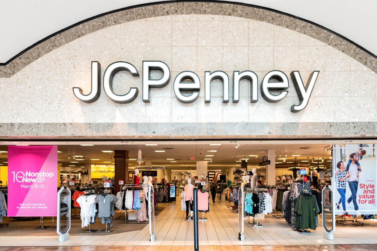 Fairfax, USA - March 13, 2018: JCPenney department outlet, retail store, shop in Fair Oaks indoor shopping mall in northern Virginia, entrance, facade, display, hangers, interior, people walking