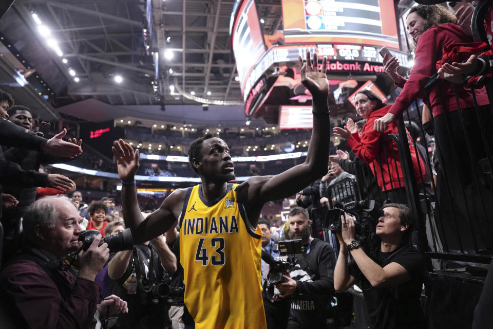 Indiana Pacers' Pascal Siakam greets fans as he comes off the court after his team's victory over the Toronto Raptors in an NBA basketball game Wednesday, Feb. 14, 2024, in Toronto. (Chris Young/The Canadian Press via AP)