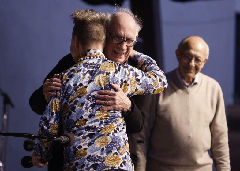Peter Sellars (back to camera) greets George Crumb before the start of the Ojai Music Festival concert on June 10, 2011.