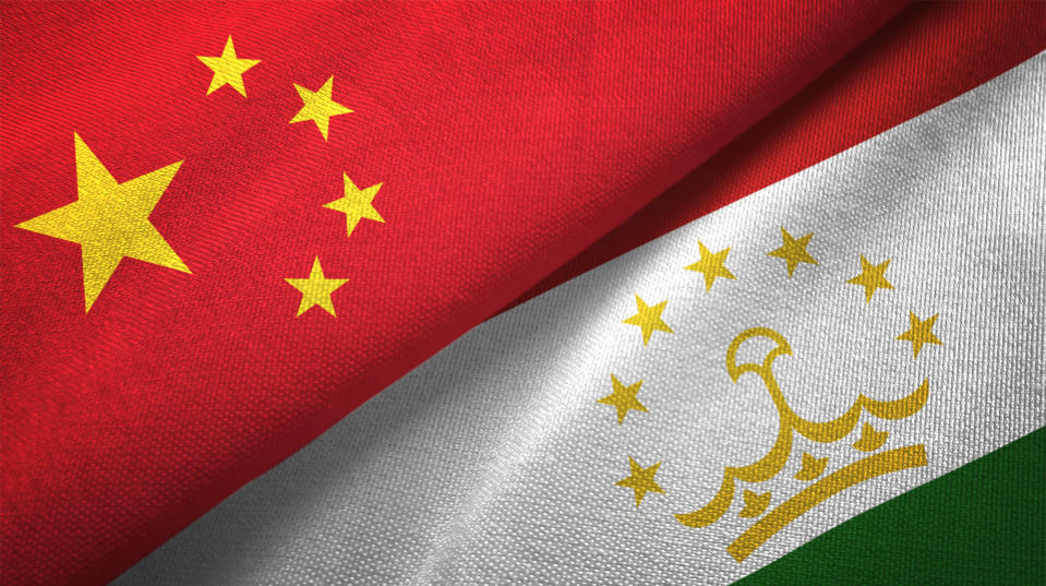 Tajikistan and China flag together realtions textile cloth fabric texture