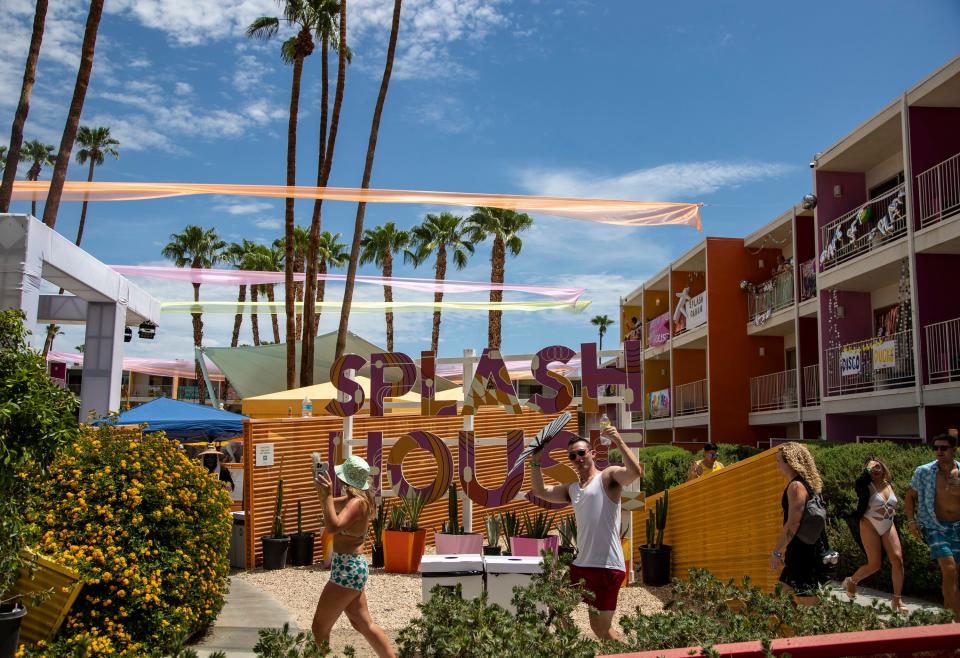 Festivalgoers arrive at the pool during weekend two of Splash House at The Saguaro in Palm Springs, Calif., Saturday, Aug. 13, 2022. 