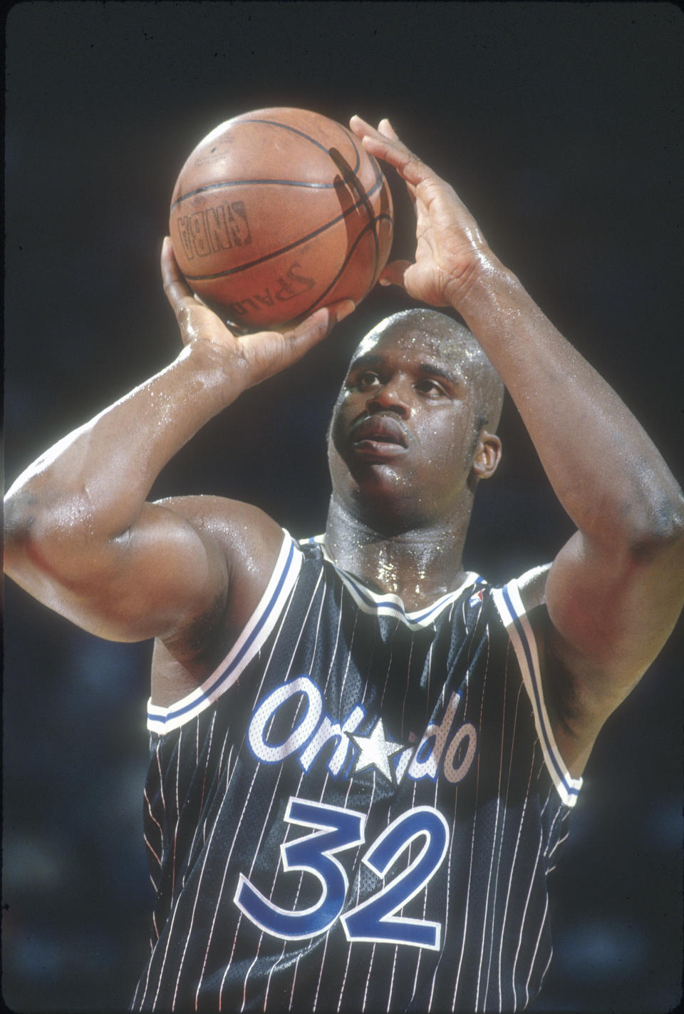 Shaquille O'Neal of the Orlando Magic shoots a foul shot in 1994. Thirty years later, he's on team JCPenney. Photo by Focus on Sport/Getty Images