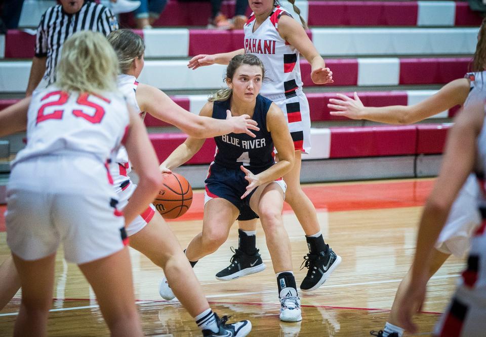 Blue River's Maci Chamberlin looks for an opening in Wapahani's defense during their game at Wapahani High School Tuesday, Nov. 30, 2021. 