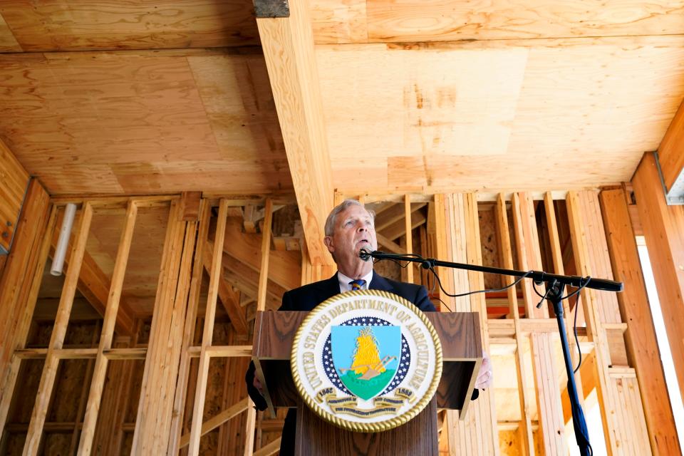 U.S. Agriculture Secretary Tom Vilsack speaks about the benefits of mass timber during a visit to a Valley Junction construction project Friday that is making use of the material.