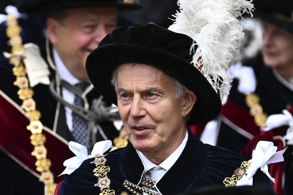 Former British Prime Minister Tony Blair arrives for the Order of the Garter service at Windsor Castle, in Windsor, England, Monday, June 13, 2022. The Order of the Garter is the oldest and most senior Order of Chivalry in Britain, established by King Edward III nearly 700 years ago. This year Prince Charles' wife Camilla, the Duchess of Cornwall, former British Prime Minister Tony Blair and former leader of the British House of Lords Baroness Amos were all installed in the Order. (Ben Stansall/Pool via AP)