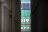 FILE- This July, 5, 2018, file photo shows a stack of China Shipping containers at the Port of Savannah in Savannah, Ga. China on Tuesday, Sept. 18, announced a tariff hike on $60 billion of U.S. products in response to President Donald Trump's latest duty increase in a dispute over Beijing's technology policy. (AP Photo/Stephen B. Morton, File)