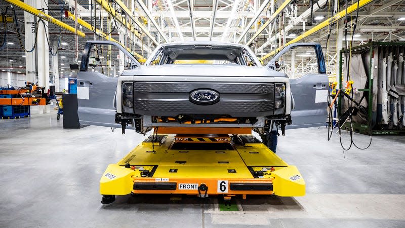 A photo of the front end of a F-150 Lightning pickup truck. 