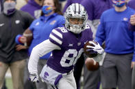 Kansas State wide receiver Phillip Brooks returns a punt for a touchdown during the first half of an NCAA football game against Kansas Saturday, Oct. 24, 2020, in Manhattan, Kan. (AP Photo/Charlie Riedel)