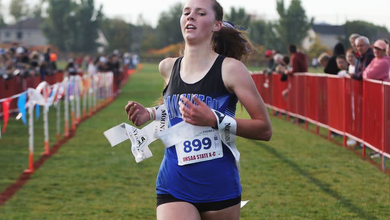 Tabi Henrie of Panguitch wins the 1A girls cross-country state championship at the Regional Athletic Complex in Rose Park on Tuesday, Oct. 24, 2023.