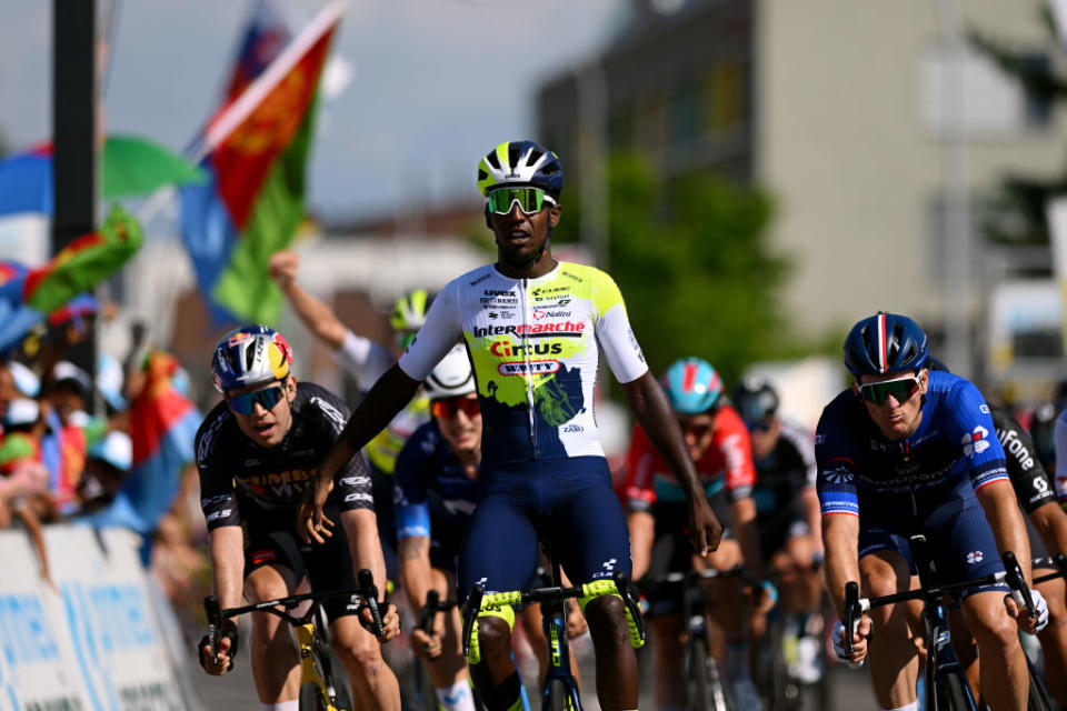 NOTTWIL SWITZERLAND  JUNE 12 Biniam Girmay of Eritrea and Team IntermarchCircusWanty celebrates at finish line as stage winner ahead of Wout Van Aert of Belgium and Team JumboVisma  Black points jersey and Arnaud Dmare of France and Team GroupamaFDJ during the 86th Tour de Suisse 2023 Stage 2 a 1737km stage from Beromnster to Nottwil  UCIWT  on June 12 2023 in Nottwil Switzerland Photo by Dario BelingheriGetty Images