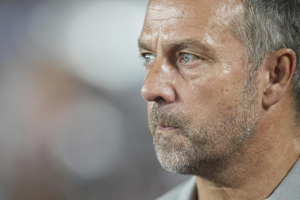 Barcelona's head coach Hansi Flick looks on prior to the start of the Champions League opening phase soccer match between Monaco and Barcelona at the Louis II stadium, in Monaco, Monaco, Thursday, Sept. 19, 2024. (AP Photo/Laurent Cipriani)