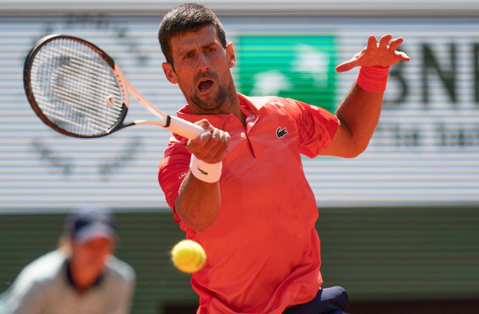 Novak Djokovic returns a shot during his match against Aleksandar Kovacevic on Day 2 of the French Open.