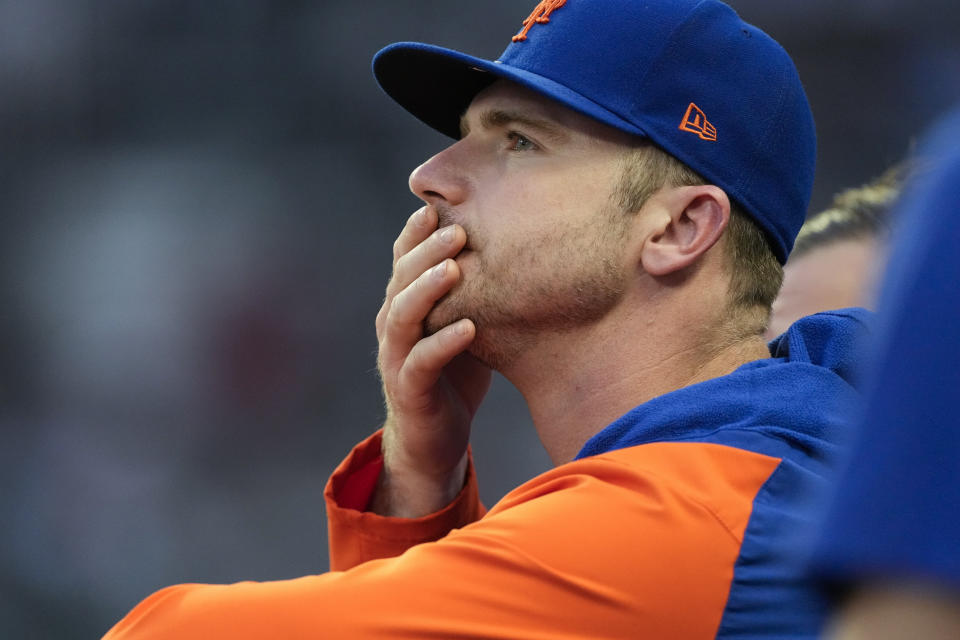 New York Mets first baseman Pete Alonso watches from the dugout after being hit by a pitch from Atlanta Braves starting pitcher Charlie Morton (50) in the first inning of a baseball game, Wednesday, June 7, 2023, in Atlanta. (AP Photo/John Bazemore)