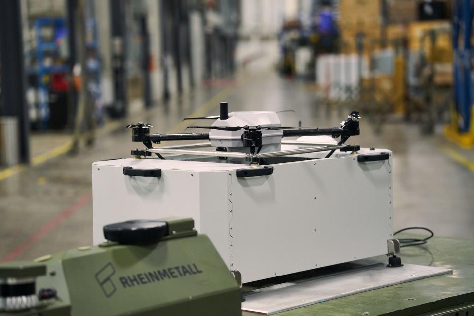 elistair khronos tethered drone on its drone box used for takeoff and landing mounted on a rheinmetall mission master sp unmanned ground vehicle