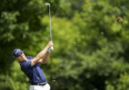 Justin Thomas, of the United States, hits his approach shot on the 18th hole during round three of the Canadian Open golf tournament at St. George's Golf and Country Club in Toronto, Saturday, June 11, 2022. (Nathan Denette/The Canadian Press via AP)