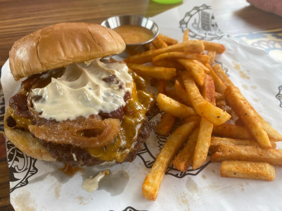 guy's burger joint cheese burger and fries pig patty