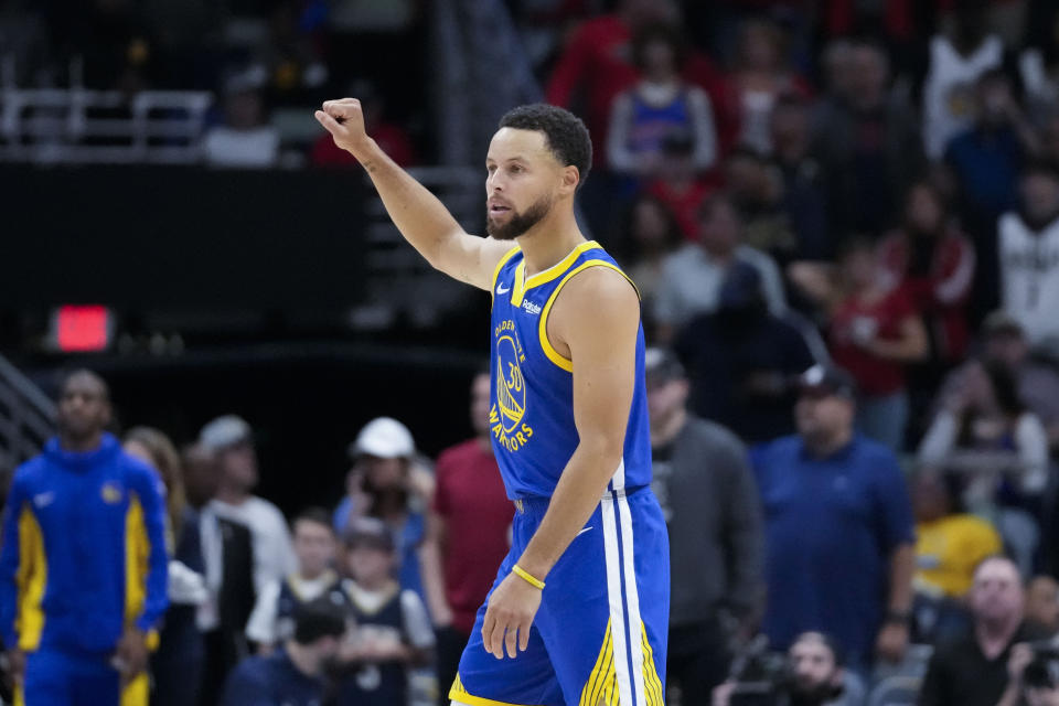 Golden State Warriors guard Stephen Curry (30) calls out on the court in the first half of an NBA basketball game in New Orleans, Monday, Oct. 30, 2023. (AP Photo/Gerald Herbert)