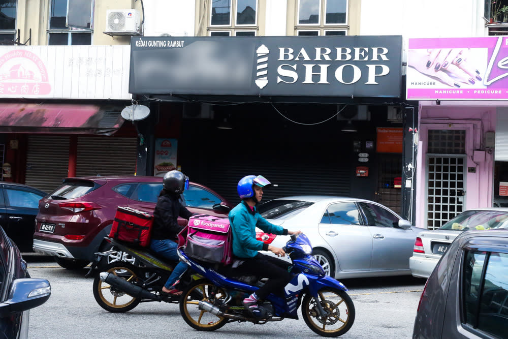 Barber shops were among one of the last sectors allowed to reopen during the first movement control order (MCO) last year. — Picture by Choo Choy May