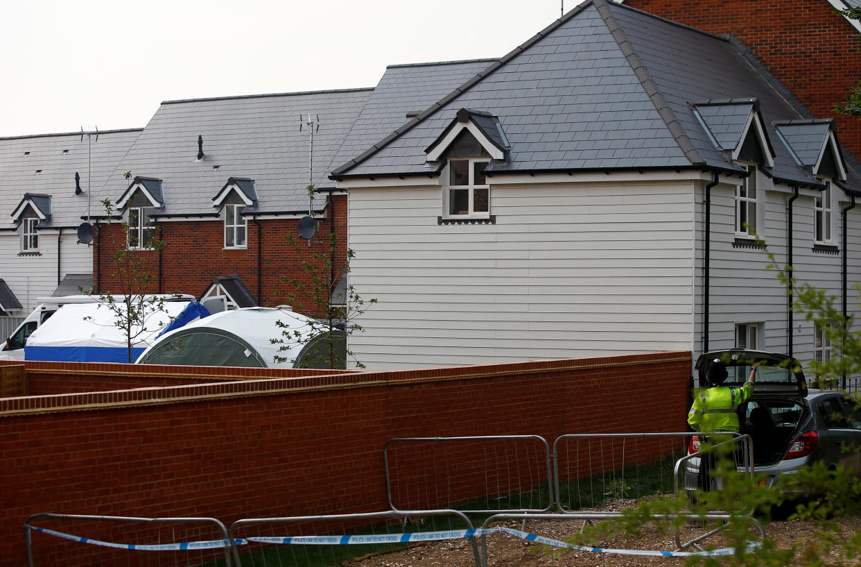 Police forensic tents can be seen to the rear of a housing estate on Muggleton Road, after it was confirmed that two people had been poisoned with the nerve-agent Novichok, in Amesbury, Britain, July 5, 2018. REUTERS/Henry Nicholls