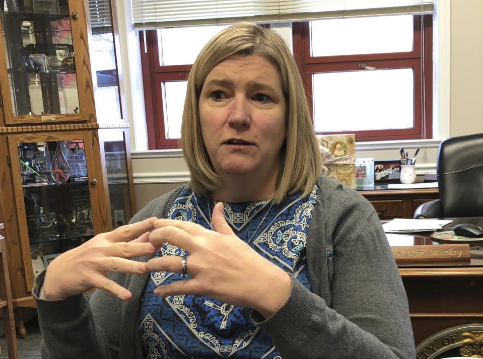 Dayton mayor Nan Whaley is interviewed in her office on Thursday, Dec. 19, 2019 in Dayton, Ohio. With a period of around 10 weeks, Dayton dealt with a Ku Klux Klan rally, a string of devastating tornadoes, and a mass shooting that killed nine people. Whaley says those events reflect a lack on action on national issues of white supremacist activity, climate change and gun violence. Her end-of-the-year reflections include searing memories of the natural disaster and attack as she looks ahead to a year dedicated to “healing and transformation.”(AP Photo/Daniel Sewell)