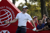 FILE - In this Sunday, Nov. 3, 2019, file photo, Rory McIlroy of Northern Ireland looks out after teeing off for the HSBC Champions golf tournament at the Sheshan International Golf Club in Shanghai. China has canceled all sporting events, such as golf and tennis, for the rest of 2020 because of the coronavirus. (AP Photo/Ng Han Guan, File)