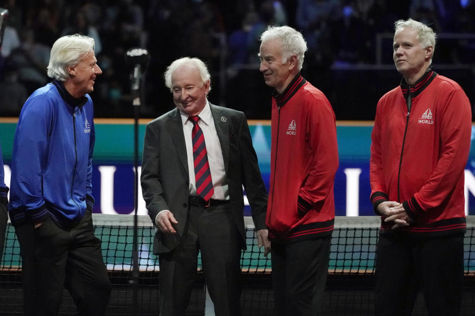 Team Europe's captain Bjorn Borg, left, chats with tennis great Rod Laver, middle, and Team World's captain John McEnroe and vice captain Patrick McEnroe, far right, after Laver Cup tennis competition, Sunday, Sept. 26, 2021, in Boston. (AP Photo/Elise Amendola)