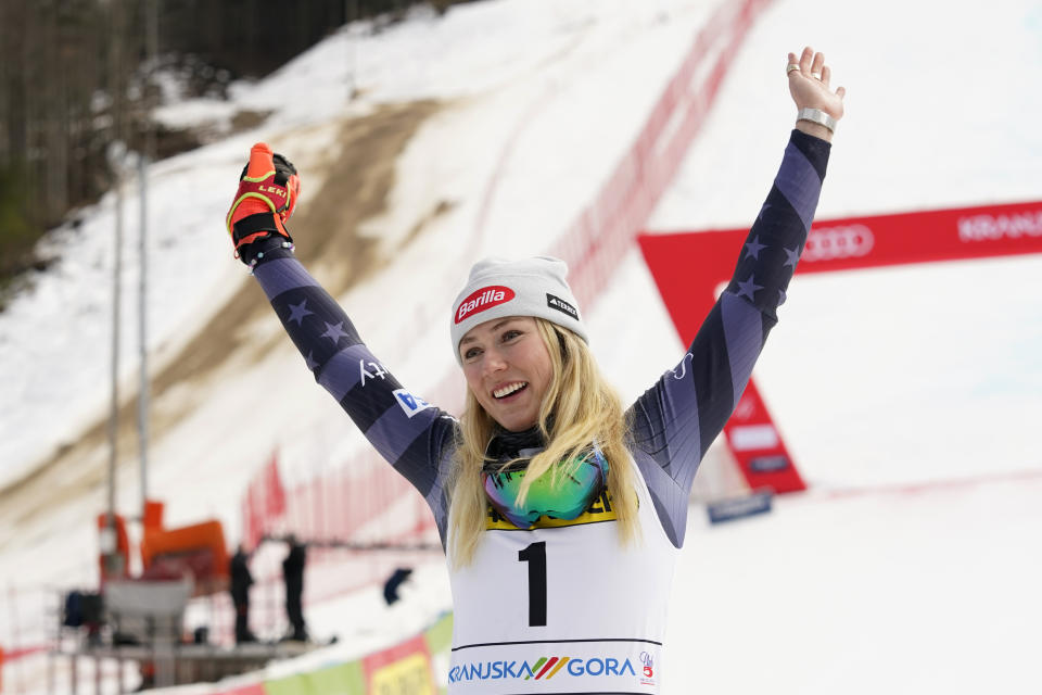 United States' Mikaela Shiffrin celebrates winning an alpine ski, women's World Cup giant slalom race, in Kranjska Gora, Slovenia, Sunday, Jan. 8, 2023. Shiffrin matched Lindsey Vonn's women's World Cup skiing record with her 82nd win Sunday. (AP Photo/Giovanni Auletta)