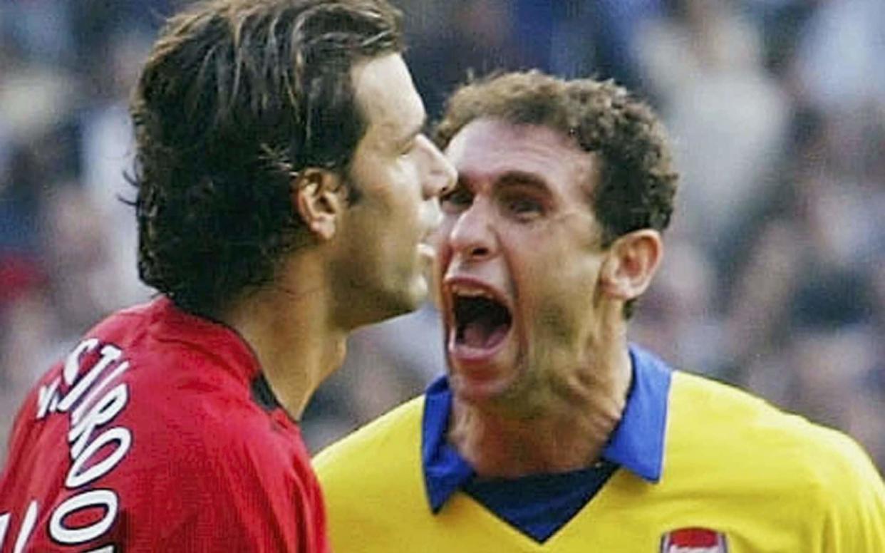 Martin Keown mocks Ruud Van Nistelrooy after his missed penalty