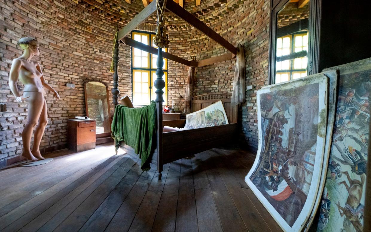 One of the bedrooms in the castle with some art work by Mr Halman/ Lord Gregorious