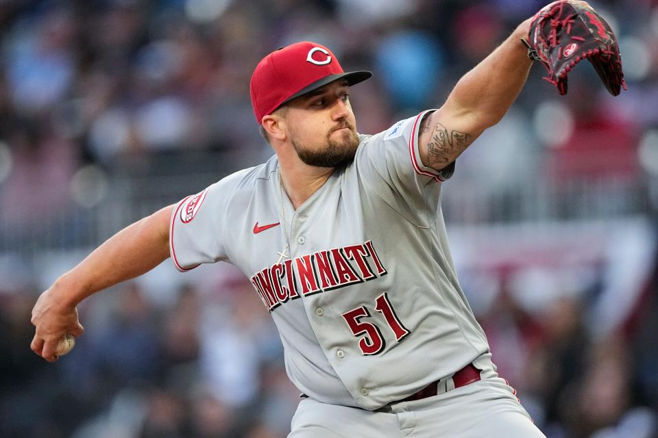 Cincinnati Reds starting pitcher Graham Ashcraft (51) delivers in the first inning of a baseball game against the Atlanta Braves, Monday, April 10, 2023, in Atlanta.