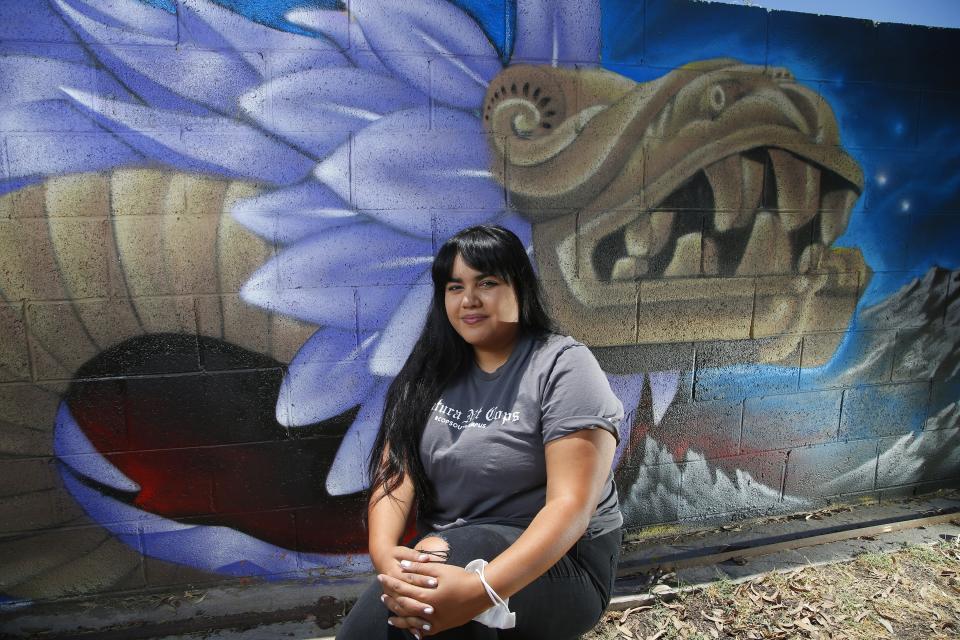 Michelle Ruiz, who started the student-led movement to get police out of schools in the Phoenix Union High School District, shown here at the Puente offices Thursday, June 18, 2020, in Phoenix. School districts around the country are voting to eliminate police from public schools. But this isn’t a sudden reaction to the killing of George Floyd in Minneapolis, but to a years-long movement led by students who say they feel unsafe with police on campus. (AP Photo/Ross D. Franklin)