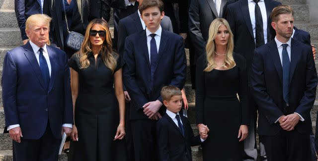 <p>Michael M. Santiago/Getty</p> (left to right): Donald Trump, Melania Trump, Barron Trump, Ivanka Trump's son Theodore James, Ivanka Trump and Eric Trump at Ivana Trump's funeral in July 2022