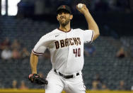 Arizona Diamondbacks' Madison Bumgarner delivers against the Atlanta Braves during the first inning of a baseball game Thursday, Sept 23, 2021, in Phoenix. (AP Photo/Darryl Webb)