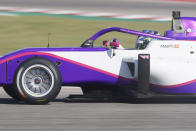 Nerea Marti, of Spain, drives into a turn during a practice session for the W Series auto race at Circuit of the Americas, Friday, Oct. 22, 2021, in Austin, Texas. (AP Photo/Darron Cummings)