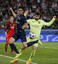 Football - Paris St Germain v FC Barcelona - UEFA Champions League Quarter Final First Leg - Parc des Princes, Paris, France - 15/4/15 Barcelona's Gerard Pique in action with PSG's Edinson Cavani Reuters / Christian Hartmann