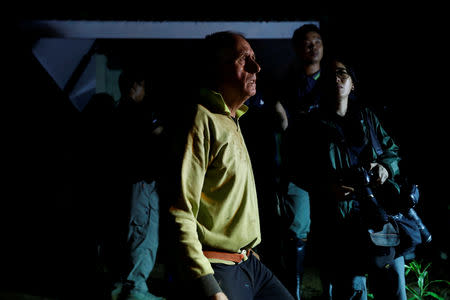 FILE PHOTO: British caver Vernon Unsworth looks to Tham Luang cave complex during a search for members of an under-16 soccer team and their coach, in the northern province of Chiang Rai, Thailand, June 27, 2018. REUTERS/Soe Zeya Tun/File Photo