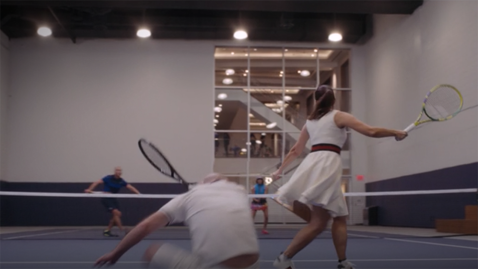 Charlotte and Harry play tennis on Waterline Club’s tennis court in the TV show. - Credit: HBO Max