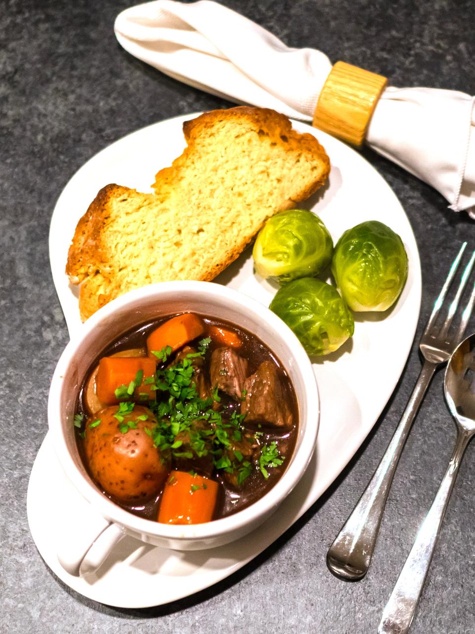 Serve Irish Guinness Beef Stew with a side of soda bread for dipping up the gravy.