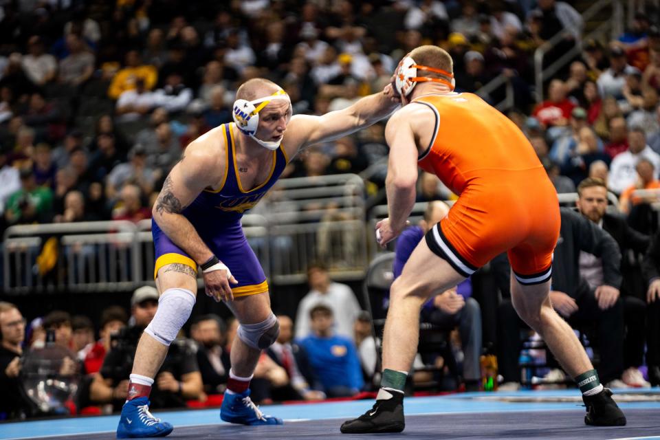 UNI's Parker Keckeisen wrestles Oklahoma State's Dustin Plott in the 184 lbs. NCAA final Saturday, March 23, 2024, at the T Mobile Center in Kansas City.