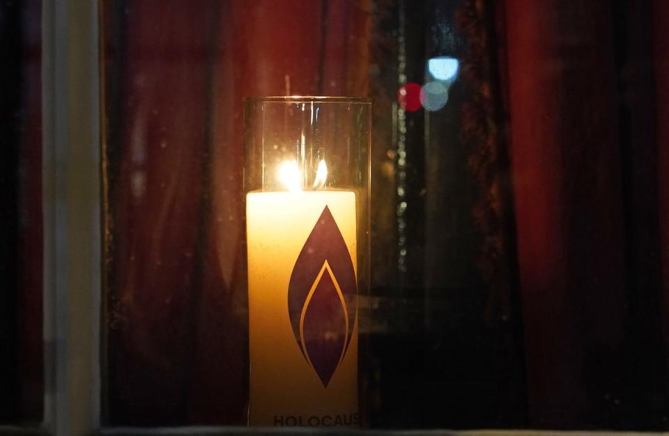 A candle in the window of 10 Downing Street, London, to mark Holocaust Memorial Day (PA)