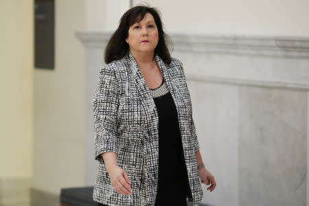 Kim Harjo leaves the courtroom on the tenth day of the retrial for actor and comedian Bill Cosby's sexual assault case at the Montgomery County Courthouse in Norristown, Pennsylvania on April 20, 2018.Dominick Reuter/Pool via REUTERS