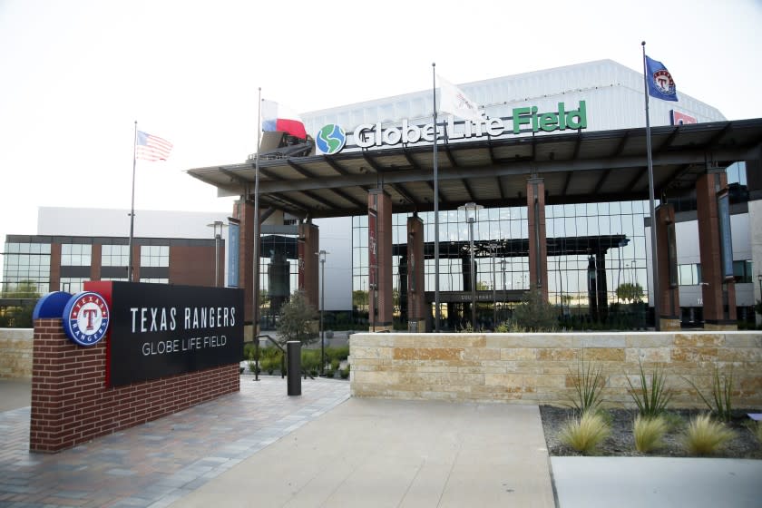 A general view of the southeast entrance Globe Life Field prior to a baseball game between the Texas Rangers and the Seattle Mariners in Arlington, Texas, Tuesday, Aug. 11, 2020. (AP Photo/Ray Carlin)