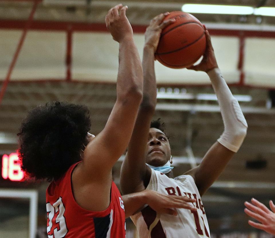 BC High's Ivan Yhomby drives to the basket during a game against Central Catholic on Thursday, February 17, 2022.